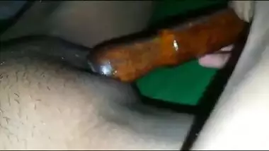 Indian MILF plays sex games with a XXX rolling pin in her sex hole