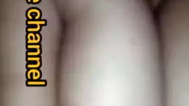 Naughty Desi woman squeezes tits to lick nipples in the porn video