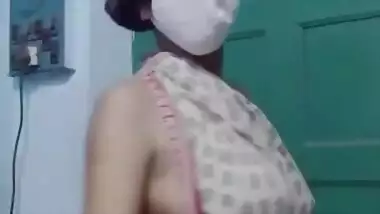Saree without a bra and a blouse.