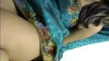 Solo Indian babe in a luxurious dress is excited so she touches tits