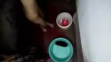 Hidden footage of naked XXX Desi housewife relaxing in the bathroom