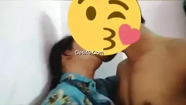 Desi girl in floral shirt kisses porn partner being covered with a smile