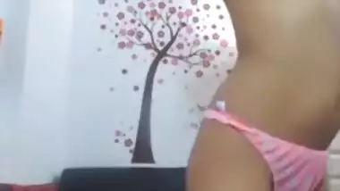 Desi chick with a wide smile strips in free XXX webcam porn show