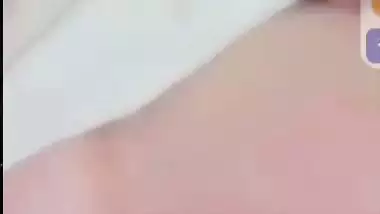 Smiling girlfriend video call to boyfriend shows boobs