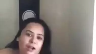 Gorgeous Desi aunty with huge XXX breasts fools around in bathroom