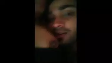 College teen girl grabs lover’s head to suck nipple