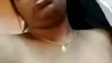 Sexy Indian wife opens big XXX hooters with dark nipples on amateur cam