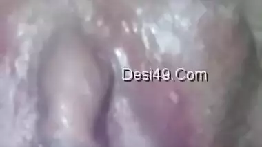 In sex clip Desi teen demonstrates nipples and perfectly shaved XXX twat