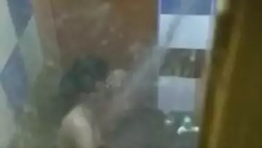 Perv is going to jerk off to porn video of Desi neighbor taking a shower