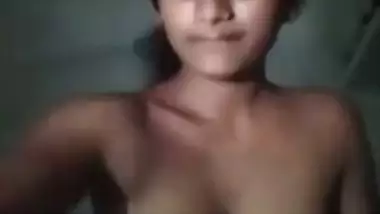 Young village slut strips to show her perky Desi tits for XXX video