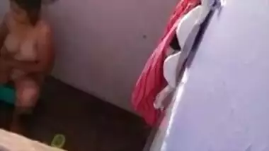 Desi girl desired man to film her in the nude while taking the shower