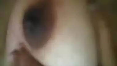 Girl can't fall asleep so she films porn video where she plays with Desi tits