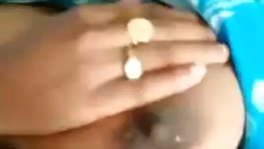 Desi Bhabhi's milking tits exposed in the close-up self-made XXX video